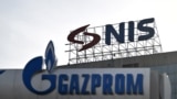 Signs at the Belgrade headquarters of Naftna Industrija Srbije AD (NIS), and the company's owner OAO Gazprom Neft.