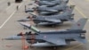 Azerbaijani - Turkish F-16 fighter jets parked at an Azerbaijani military airfield, 20Sep2014. 