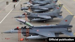 Azerbaijani - Turkish F-16 fighter jets parked at an Azerbaijani military airfield, 20Sep2014. 