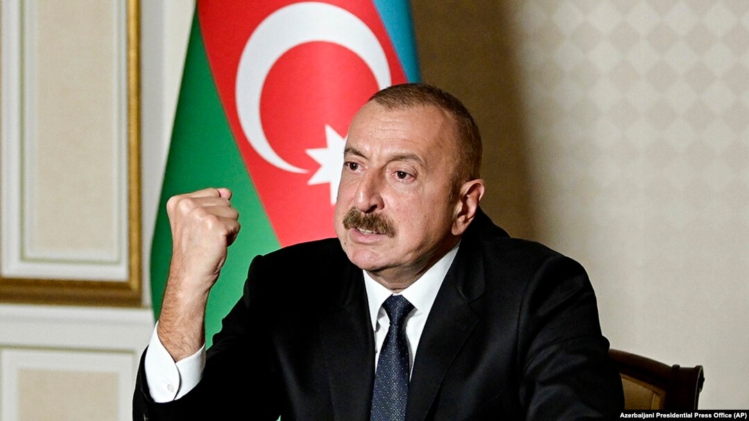 AZERBAIJAN -- Azerbaijani President Ilham Aliyev gestures as he addresses the nation in Baku, October 20, 2020