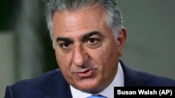 Prince Reza Pahlavi, the exiled son of Iran's last shah and a critic of the country's clerical leaders, speaks during an interview with AP in Washington, Tuesday, Jan. 9, 2018