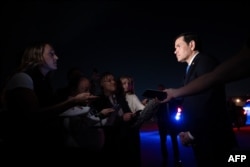 US Secretary of State Marco Rubio speaks to reporters before departing from Joint Base Andrews in Maryland on July 19.