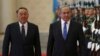 Kazakh President Nursultan Nazarbaev (left) and Israeli Prime Minister Benjamin Netanyahu review a guard of honor during a welcoming ceremony for the latter in Astana on December 14.