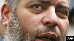 Muslim cleric Mustafa Kamal Mustafa, also known as Abu Hamza al-Masri, in a 2003 photo