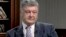Ukrainian President Petro Poroshenko speaks to the 1+1 TV channel in Kyiv on May 12.
