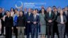 Ukrainian President Volodymyr Zelenskiy (second left), German Chancellor Olaf Scholz (center), and other attendees pose for a photo in Berlin on June 11. 