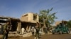 Afghan soldiers at the site of a bomb explosion in Herat province in April 10.