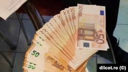  Gruparea este suspectă și de spălare de bani