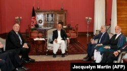 U.S. Secretary of State Mike Pompeo, left, met with Afghan President Ashraf Ghani, Afghan Chief Executive Officer Abdullah Abdullah, and former Afghan President Hamid Karzai, right, at the Presidential Palace in Kabul, on June 25.