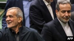 Məsud Pezeşkian və Abbas Əraqçi