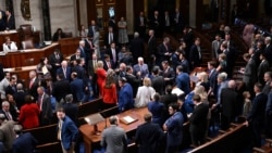 US Congress members on the floor of the House of Representatives at the US Capitol in Washington in July 2025.