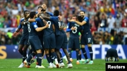 French soccer player celebrate winning the World Cup in Moscow on July 15. 