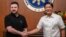 Ukrainian President Volodymyr Zelenskiy (left) shakes hands with Filipino President Ferdinand Marcos in Manila on June 3.