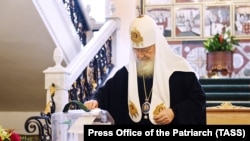 Patriarch Kirill casts his ballot at his residence in Moscow during elections on June 25.
