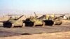 Three Taleban army tanks stand at Shindand airbase in Afghanistan's Farah province on October 1. The Taleban, the purist Afghan Islamic militia, have deployed the tanks to defend the air base from any attack from Iran.