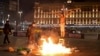 In November 2021, protest artist Pavel Krisevich was sentenced to 15 days in jail for a protest in front of the Federal Security Service’s headquarters in Moscow in which he was staged a mock crucifixion of himself over burning files.