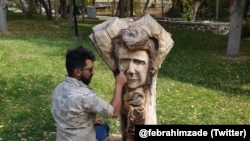 Iran -- Shajarian memorial carved by 