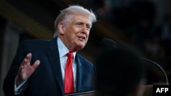 US President Donald Trump delivers the State of the Union address in Washington.