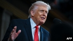 Доналд Трамп, раисҷумҳури Амрико, ҳангоми суханронӣ дар Конгресс