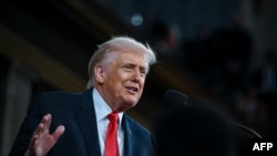 АҚШ президенті Дональд Трамп Конгреске жолдауын оқып тұр. Вашингтон, 24 ақпан, 2026 жыл. (Фото авторы HOLSTON / POOL / AFP)