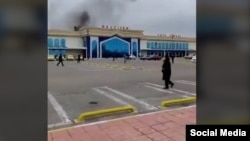 A video grab shows smoke rising after a suspected Iranian drone strike in Azerbaijan's region of Nakhchivan.