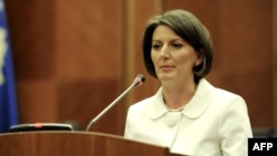 Newly elected President Atifete Jahjaga addresses parliament in Pristina on April 7.