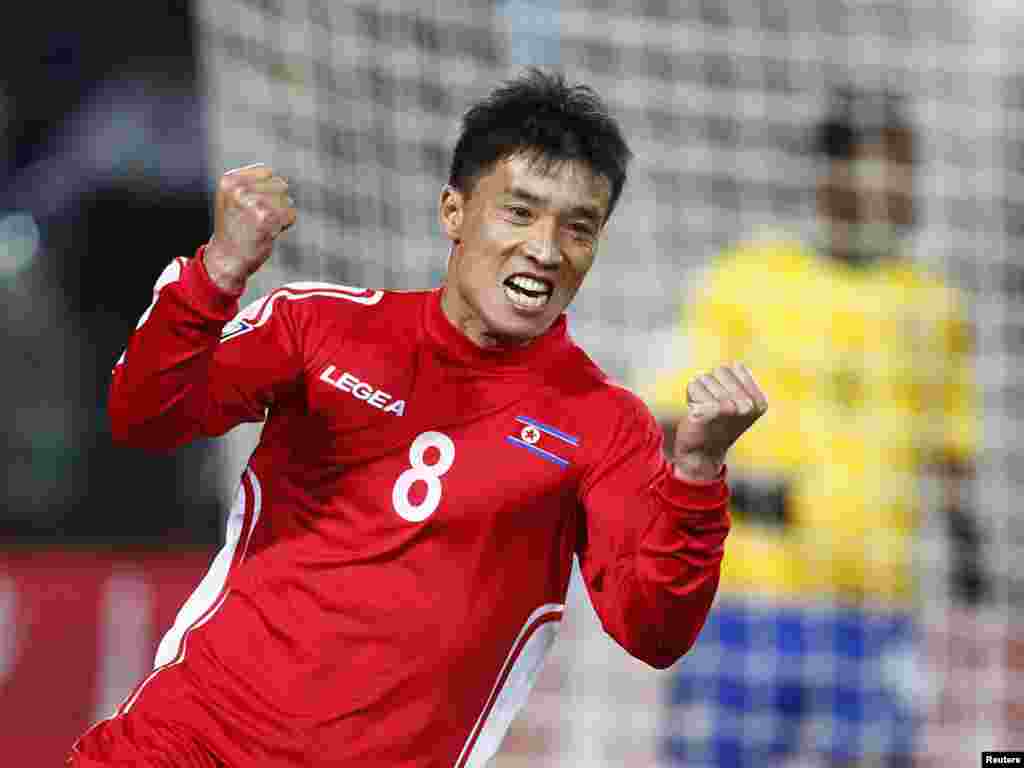 South Africa -- North Korea's Ji Yun-nam celebrates his goal during a 2010 World Cup Group G soccer match at Ellis Park stadium in Johannesburg,15Jun2010 - North Korea's Ji Yun-nam celebrates his goal during the 2010 World Cup Group G soccer match against Brazil at Ellis Park stadium in Johannesburg June 15, 2010. REUTERS/Kai Pfaffenbach (SOUTH AFRICA - Tags: SPORT SOCCER WORLD CUP)