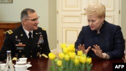 U.S. General Curtis Michael Scaparrotti (left) talks with Lithuanian President Dalia Grybauskaite in Vilnius on March 16.