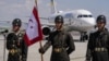 Turkish soldiers stand guard as a plane carrying Ukrainian President Volodymyr Zelenskyy arrives in Ankara ahead of a NATO summit on July 7.  