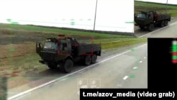 Удар украинского БпЛА по российской военной технике на трассе под Мариуполем. Скриншот с видео из телеграм-канала 1-го корпуса НГУ «Азов»