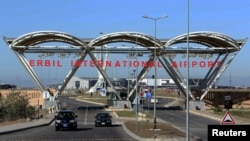 Iraq -- Vehicles drive out of the Irbil International Airport, November 23, 2015