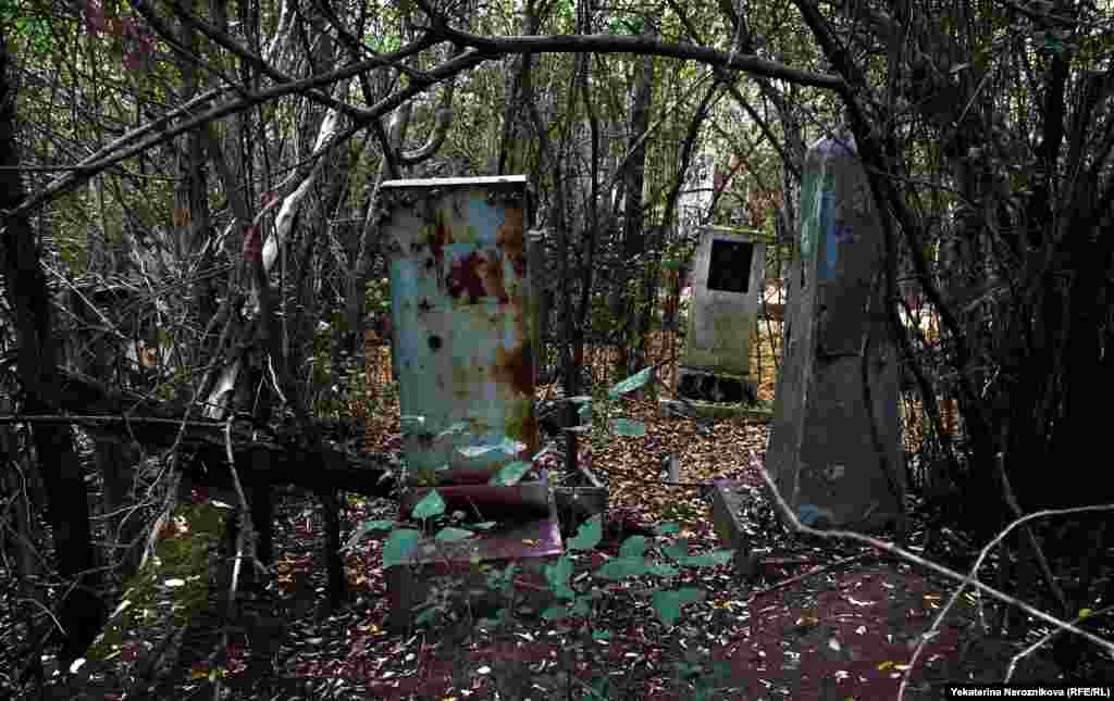 Snails cluster on the top of some tombstones. After the wars, a 2010 census counted just 24,000 ethnic Russians remaining in Chechnya.