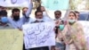 Pakistani journalists and members of civil society take part in a demonstration to condemn attacks on journalists in Islamabad on May 28.