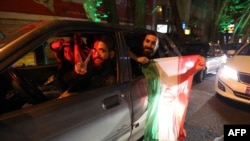 Iranians celebrated the agreement on the streets of Tehran late on April 2.