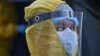 Armenia -- A medical worker wearing protective gear is seen outside the Grigor Lusavorich Medical Center in Yerevan on June 9, 2020.