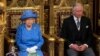 Elisabeta a II-a a Marii Britanii, alături de Regele Charles al III-lea, în timpul deschiderii de stat a Parlamentului Marea Britanie, în Londra, 21 iunie 2017.
