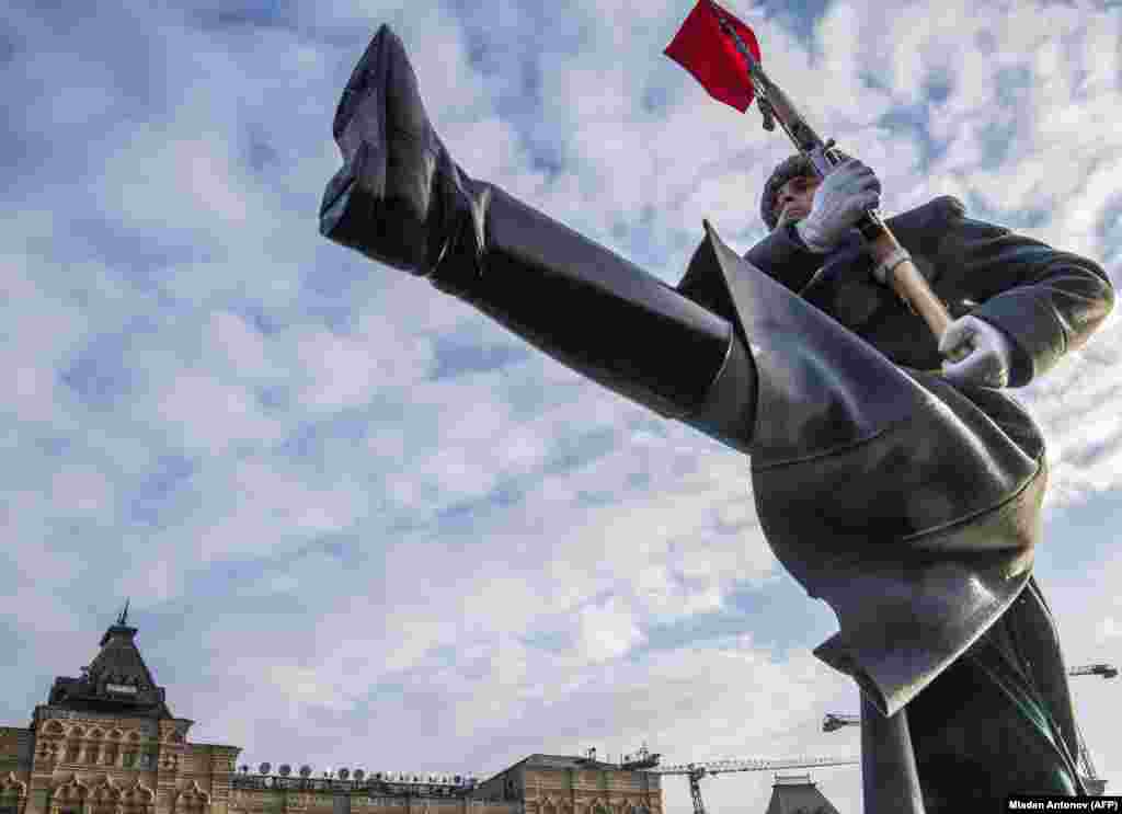 A Russian honor guard marches during a military parade on Red Square in Moscow on November 7. (AFP/Mladen Antonov)