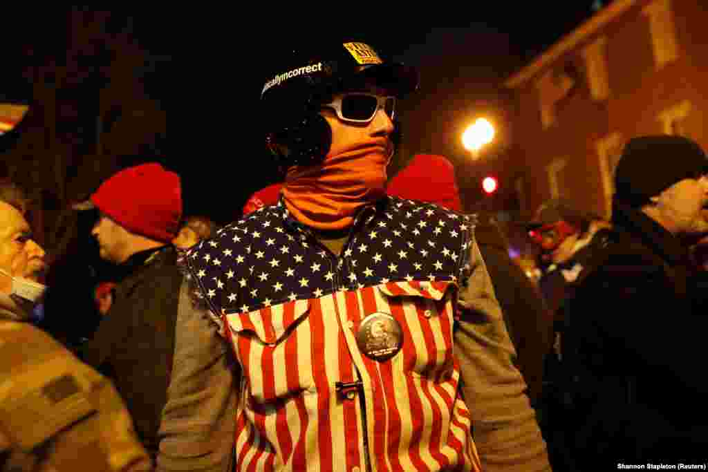 A supporter of U.S. President Donald Trump looks on during protests in Washington, U.S., January 5, 2021