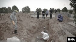 Burial of coronavirus victims in Iran. April 6, 2020