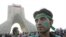 Iran -- Supporters of former Iranian Premier and reformist presidential candidate, Mir Hossein Musavi with green ribbons (Musavi's campaign color) on Azadi (Freedom) square, Tehran, 10Jun2009
