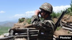 An Armenian Soldier at a military observation post