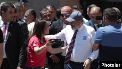 Armenia - Prime Minister Nikol Pashinian is approached by a supporter during an election campaign trip to Echmiadzin, June 7, 2021.