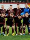 Jucătorii echipei naționale de fotbal din Belarus pozează într-o fotografie de grup înainte de meciul contra Elveției, 25 martie, stadionul Karadjordje din Novi Sad, în Serbia. Meciul a fost câștigat de naționala Elveției, cu scorul de 5-0.