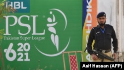 A policeman stands guard outside the National Cricket Stadium in Karachi on February 18.