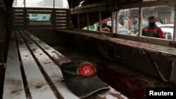 A hat remains on a bench after a blast killed three officers of the Frontier Constabulary in Peshawar on November 22.