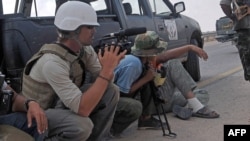 U.S. freelance reporter James Foley (left) was executed by the Islamic State group in Syria.