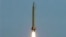 An earlier version of the Shahab-3 ballistic missile is test-fired in the desert outside the city of Qom in late 2006.