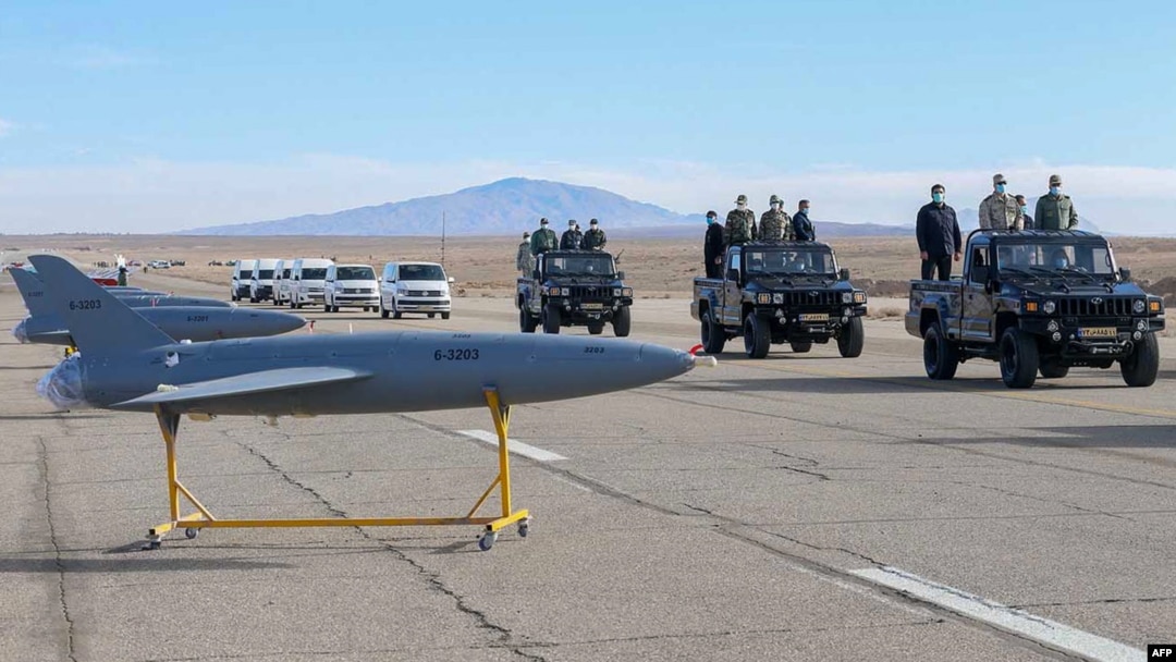Iranian military officials inspect drones on display prior to a drill at an undisclosed location in central Iran. (file photo)