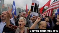 Protests continued in the capital, Tirana, on June 8 as thousands of demonstrators have taken to the streets in recent months to protest against what they see as government corruption and vote-stealing in parliamentary elections two years ago.