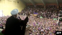 Iranian President Hassan Rouhani greeting voters in May 2017, as they hope he will deliver on promises of more liberalization.